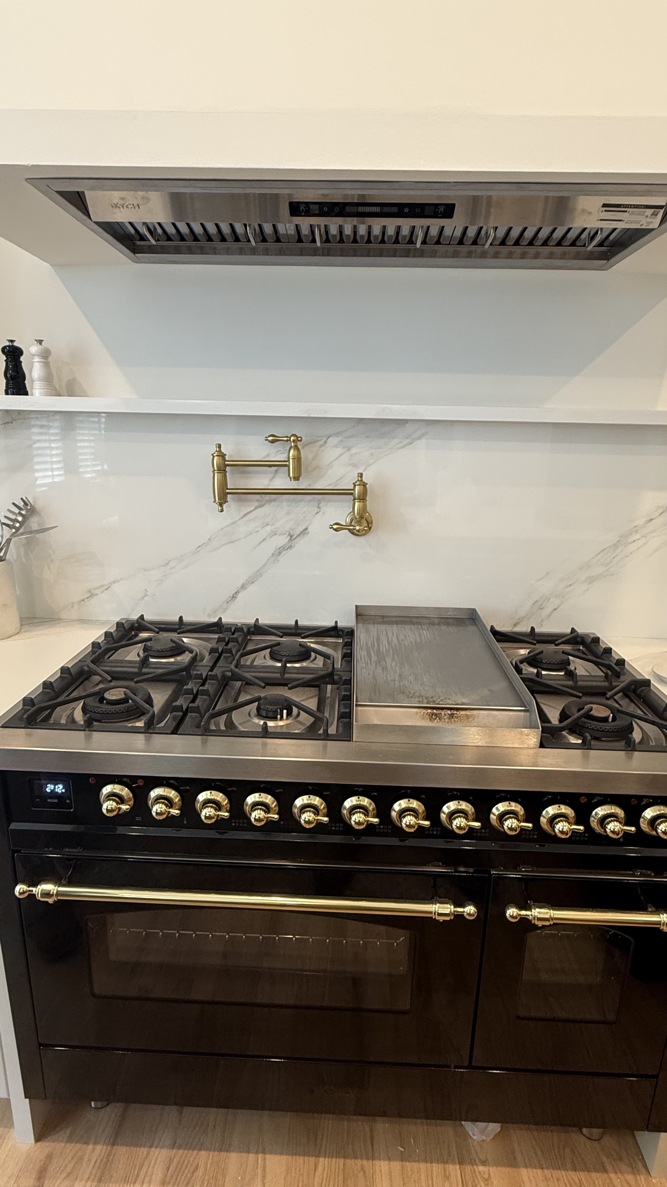 Finished kitchen range plumbing and pot filler